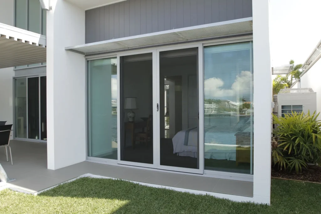 Commandex Xceed sliding security doors on a modern home